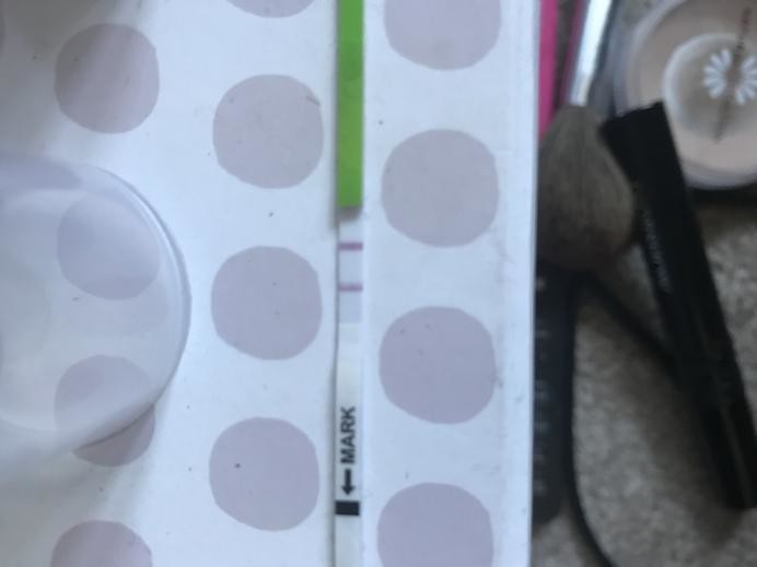 Positive ovulation test a day before AF?!?